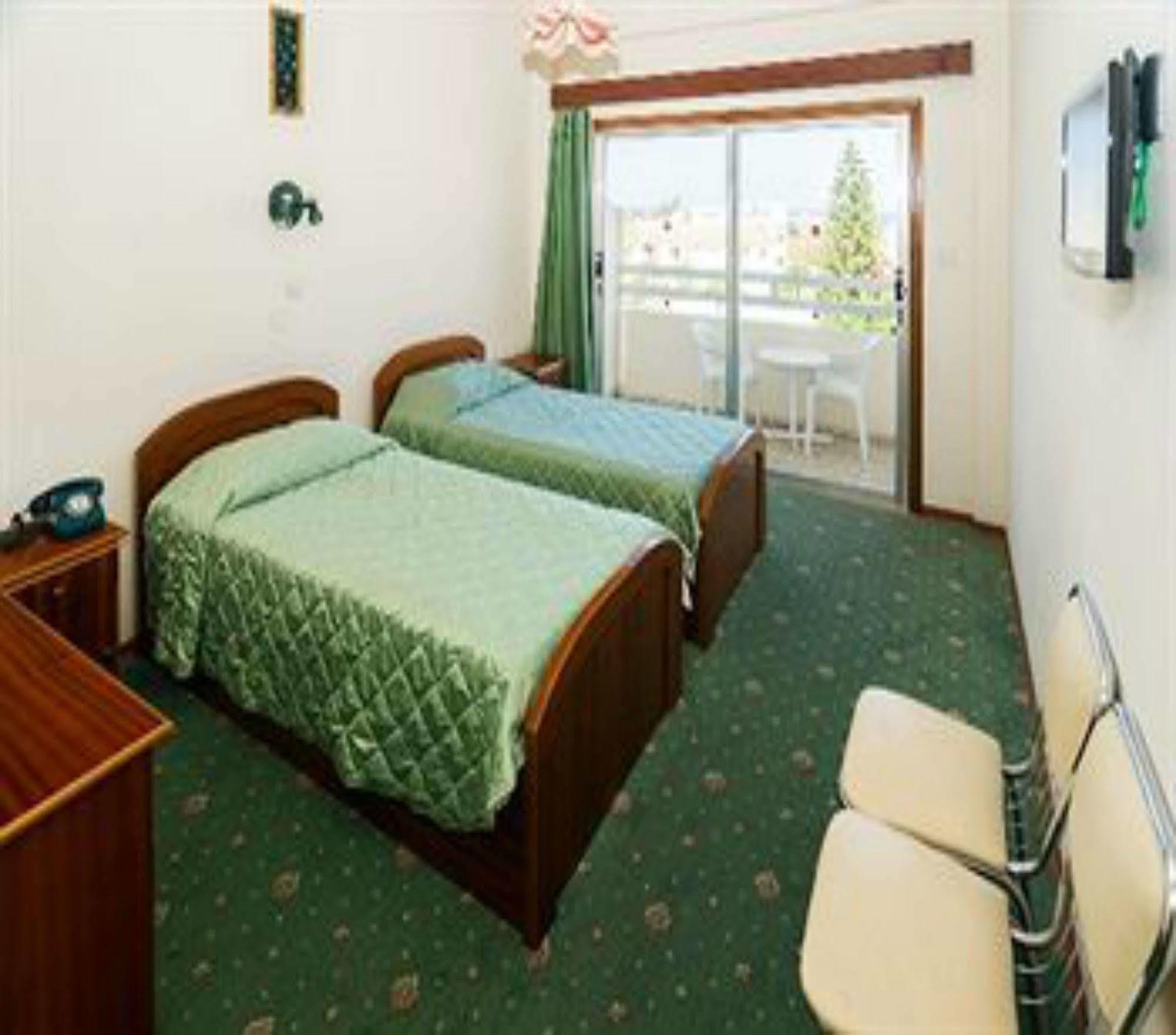 Marion Hotel Polis Quarto foto